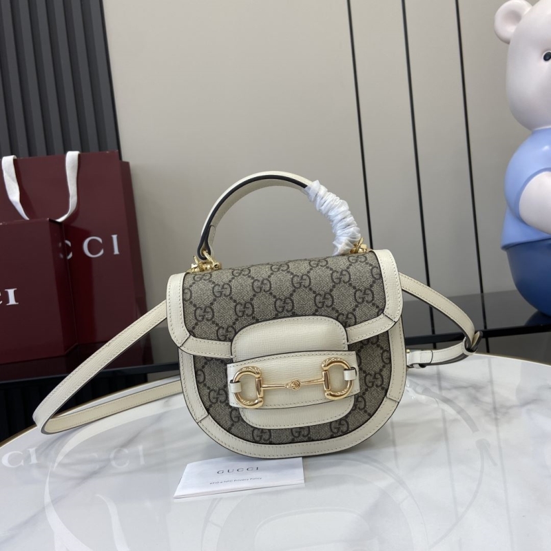 G*u*i top handle bags